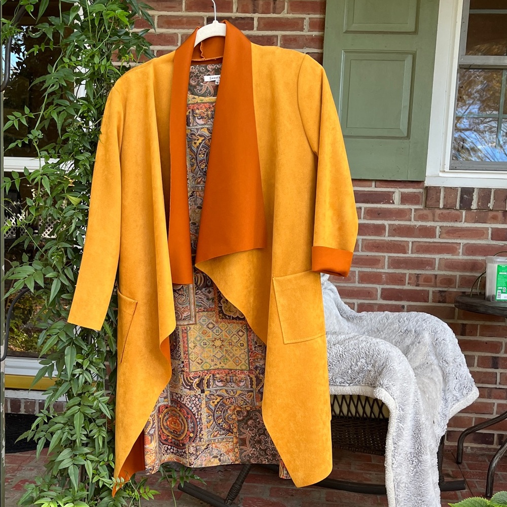 Vibrant Orange Open Front Faux Leather Coat and Paisley Shift Dress Coordinates